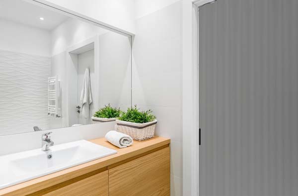 Vouwdeur grijs kunstleder op maat