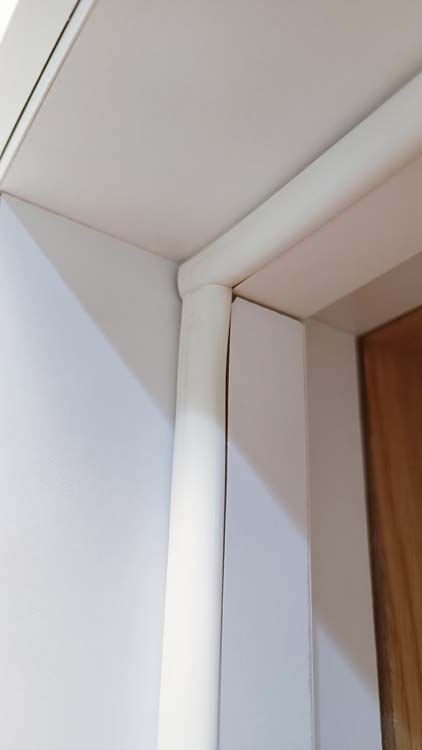 Porte intérieure complète Uran blanche 201,5x63cm alvéolaire réversible + châssis 40cm