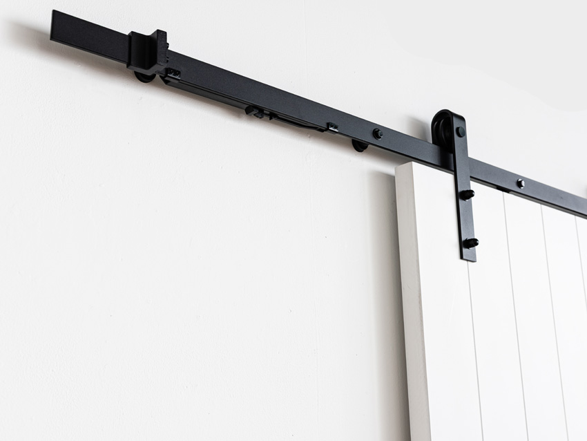 Porte coulissante simple à peindre complète Titus 93x211,5cm + rail robuste noir + guide mural