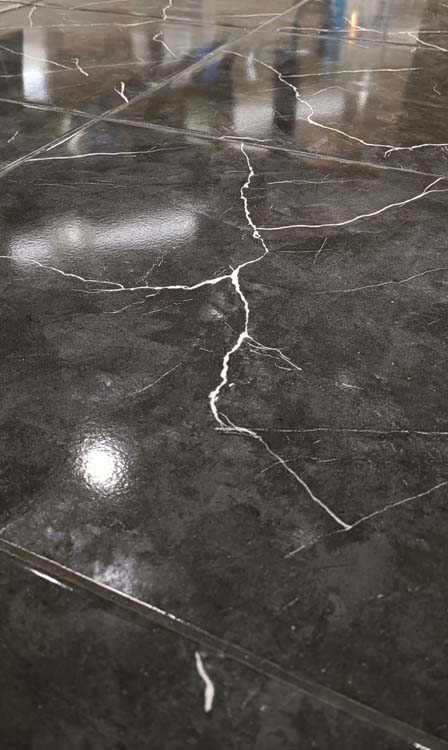 Carrelage de sol et mural Apollo Marmi imitation marbre noir brillant 50x50cm