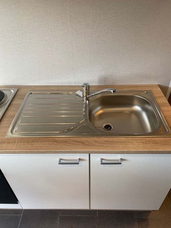 Cuisine Budget blanc/aspect bois 270cm - hotte murale en inox - sans appareils