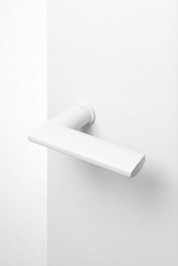 Deurkruk Xinnix 004.22 aluminium geanodiseerd wit complete set excl. rosas