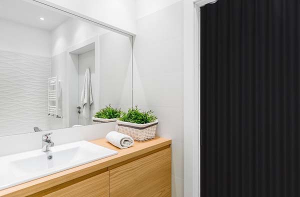 Vouwdeur zwart kunstleder op maat