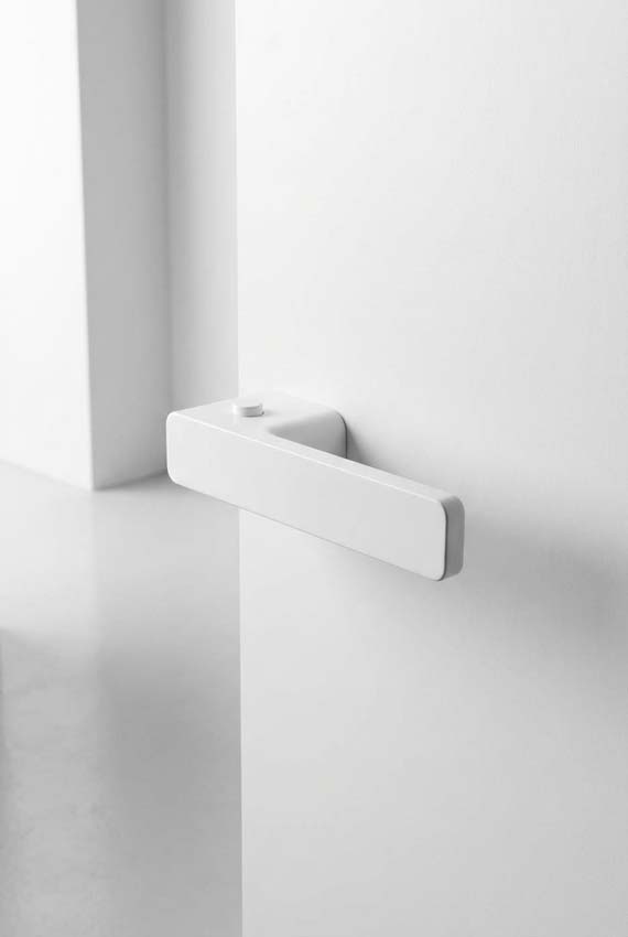 Deurkruk Xinnix vergrendelbaar rechts aluminium geanodiseerd wit complete set excl. rosas